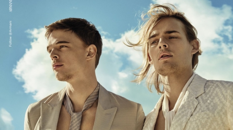 Donning neutral suits, André Bona and Ton Heukels front Emporio Armani's spring-summer 2019 campaign.