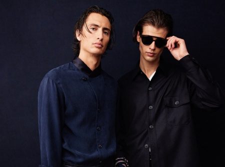 James Turlington and Bastien De Bels pose behind the scenes at Giorgio Armani's spring-summer 2022 show.