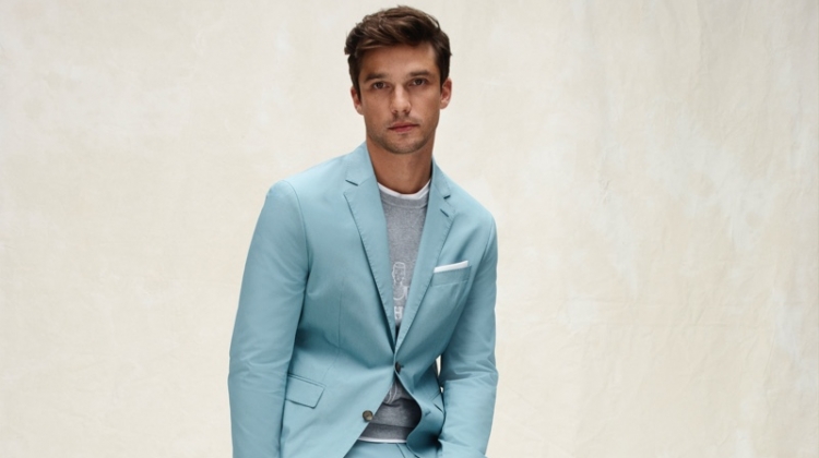 Embracing a pop of color, Alexis Petit sports a suit from Tommy Hilfiger Tailored's spring-summer 2020 collection.